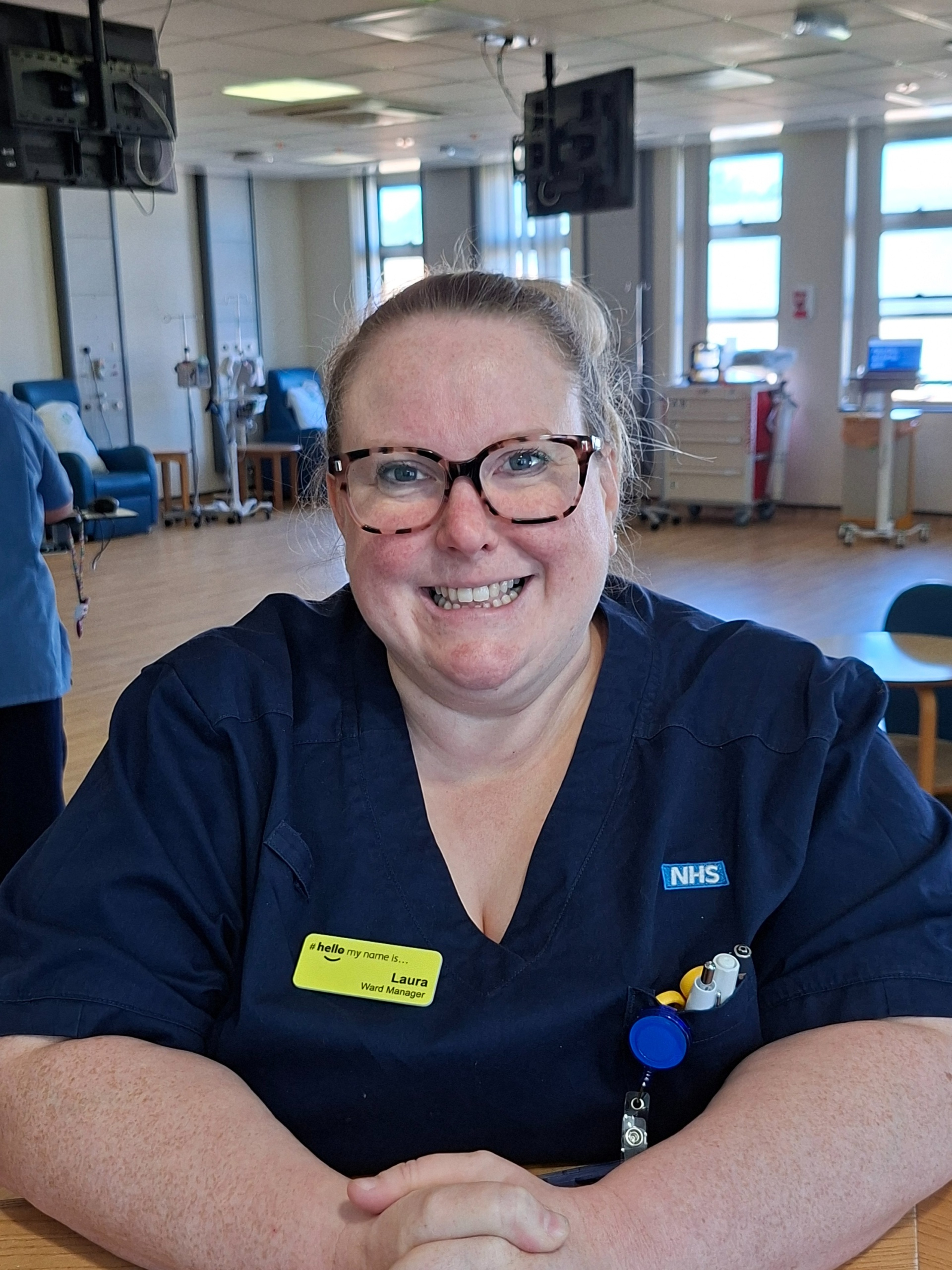 Nurse in dark navy uniform