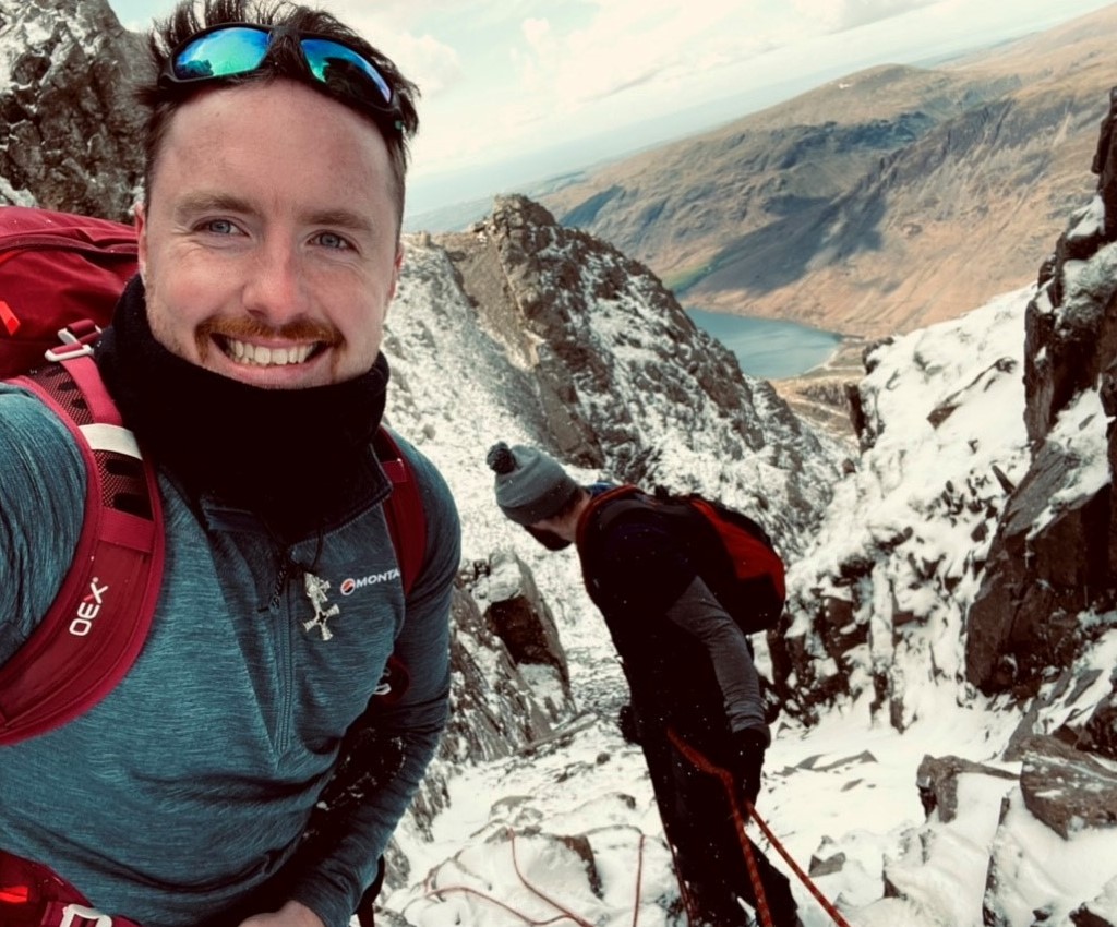 Tristan Jones-Roberts climbing a mountain