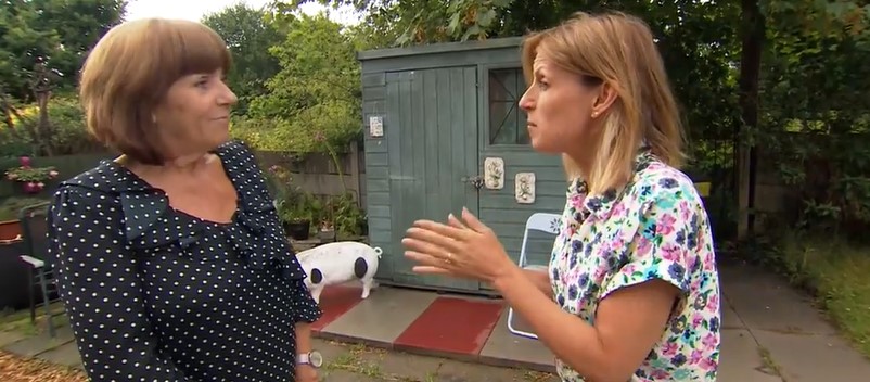 Karen Cowley, left, talks to an ITV reporter about her bowel cancer experience