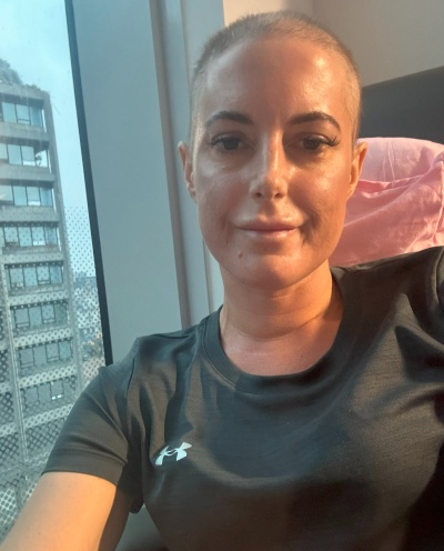 Catherine is taking a selfie during her chemo treatment 