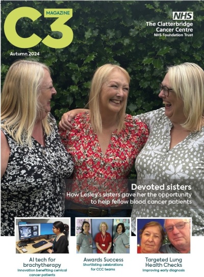 Three women laughing together - they are the main image on the front of a magazine. The magazine is entitled C3. 
