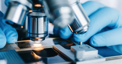 Microscope being used for research